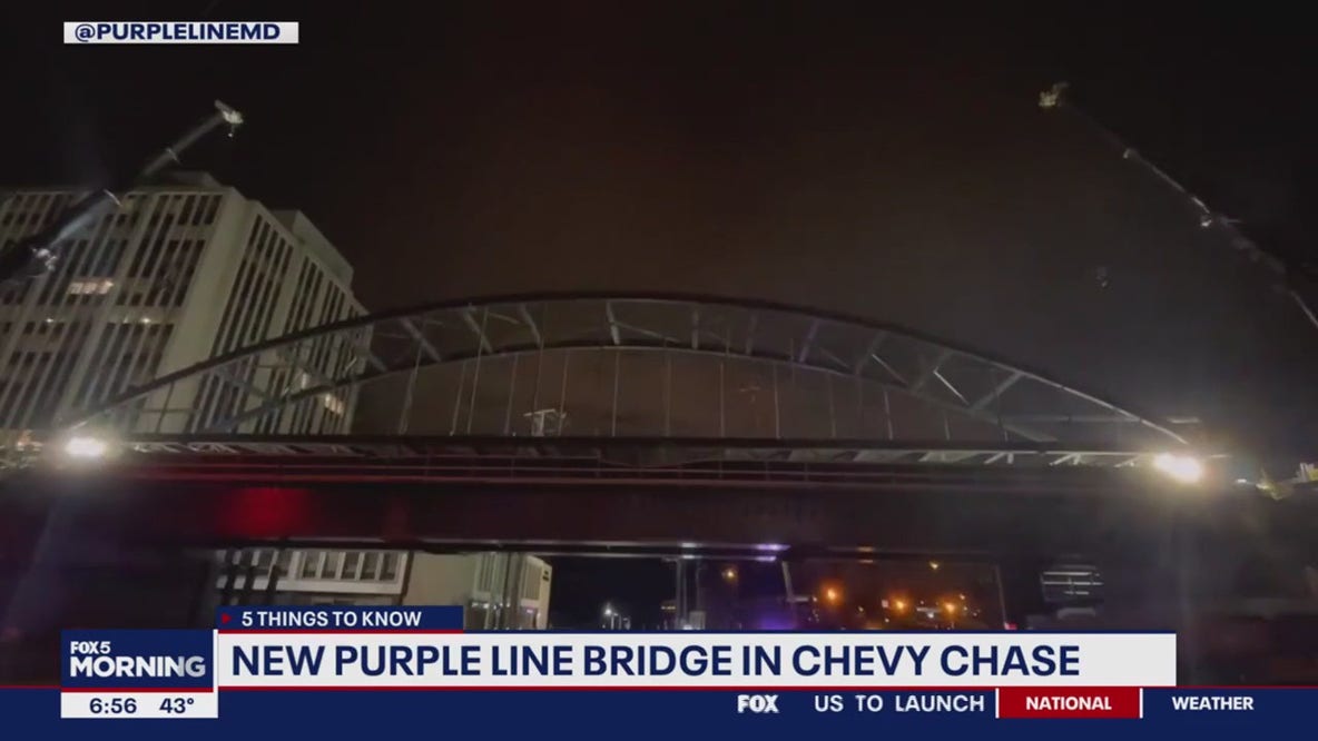 Purple Line construction crews lower arches on bridge in Chevy Chase